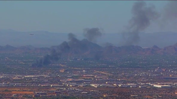 Fire burning in central Phoenix sends plume of smoke into air