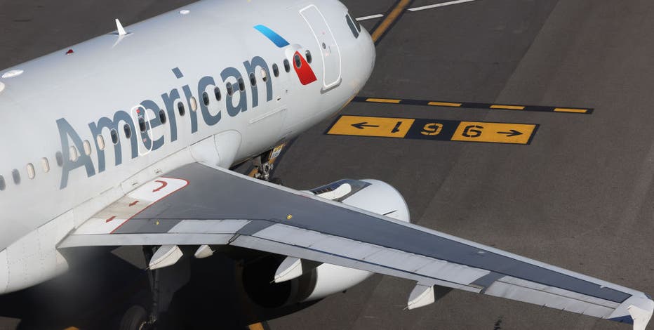 Woman who said airline passenger was 'not real' apologizes