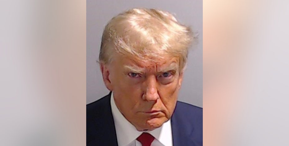 Trump surrenders at Fulton County Jail, mug shot released