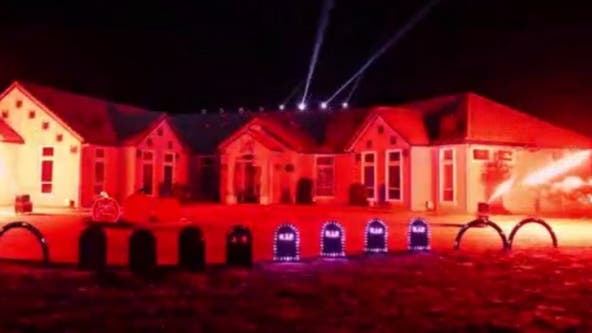 Home transformed into Halloween light, fire display