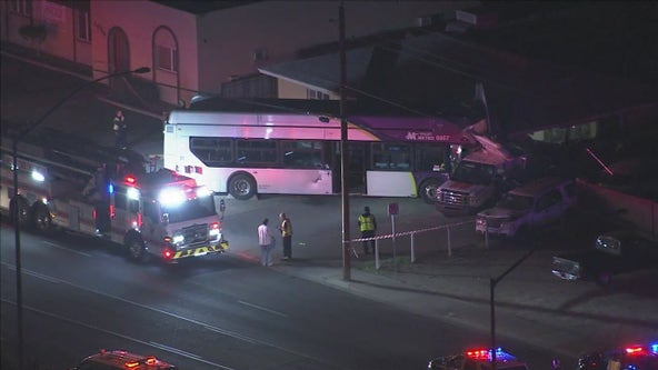 Bus crashes into Mesa home; several people injured