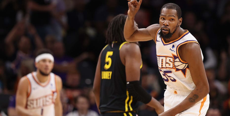 Durant, Booker lead Suns to fifth straight win, beat skidding Warriors 123-115