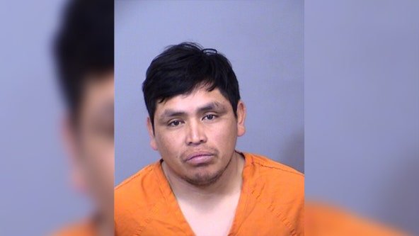 Man accused of crashing into Arizona house with child in car