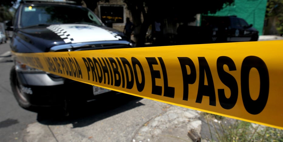 A dozen bodies found in Mexico, 5 piled in an SUV and 7 others near the US border with Arizona