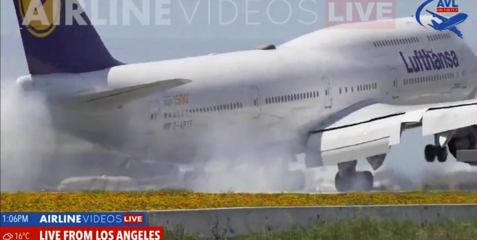 Boeing 747 carrying 345 people bounces on LAX runway during hard landing, video shows