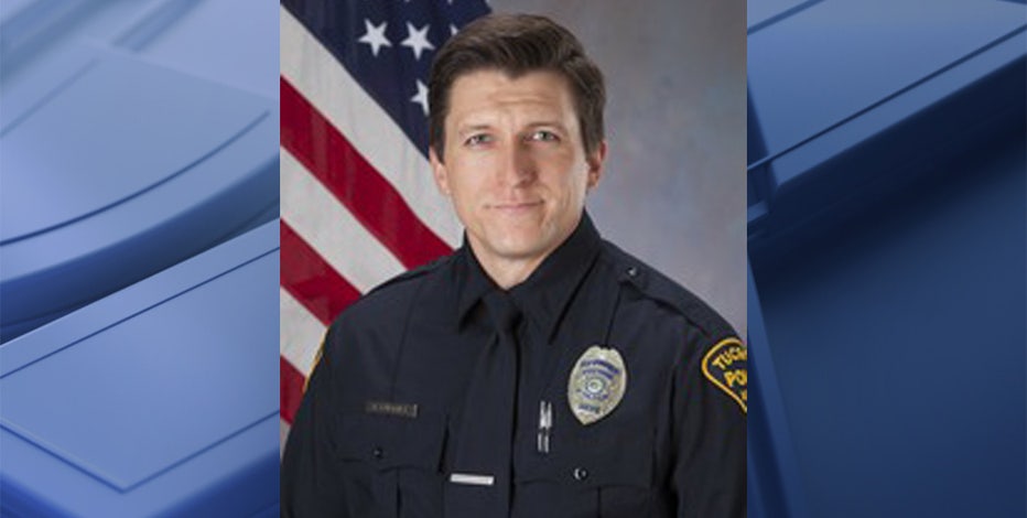 Man charged with causing car crash that killed Tucson Police Officer Adam Buckner