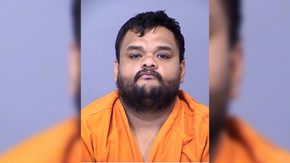 Man arrested, accused of stabbing woman to death inside Phoenix home: PD