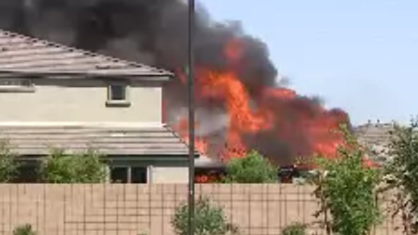 Barricaded suspect found dead after house erupts in flames with in Surprise: PD
