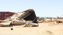 Severe weather leaves Buckeye neighborhood in disarray with mobile home flipped and downed power poles