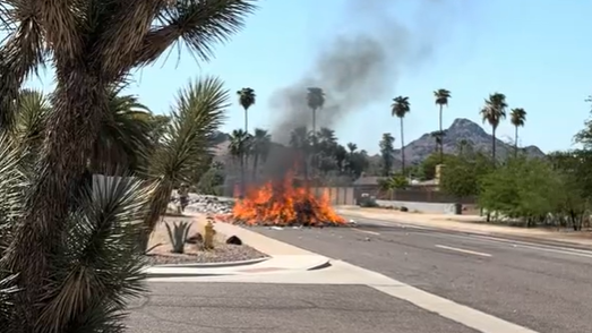 Trash fire from Phoenix garbage truck causes it to drop the load in a neighborhood