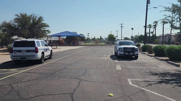 Boy accused of pointing a gun at a Phoenix school bus full of students, PD says