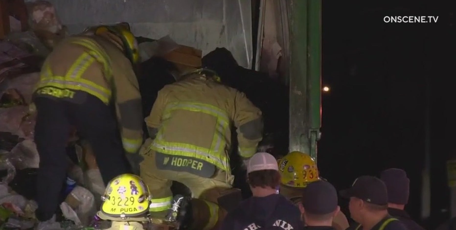 Woman found stuck inside Phoenix garbage truck