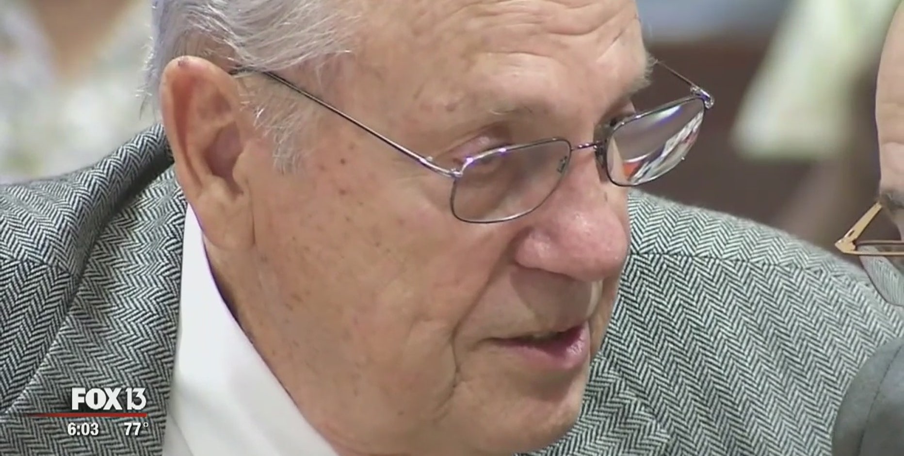 Defense says thrown cell phone prompted theater shooting