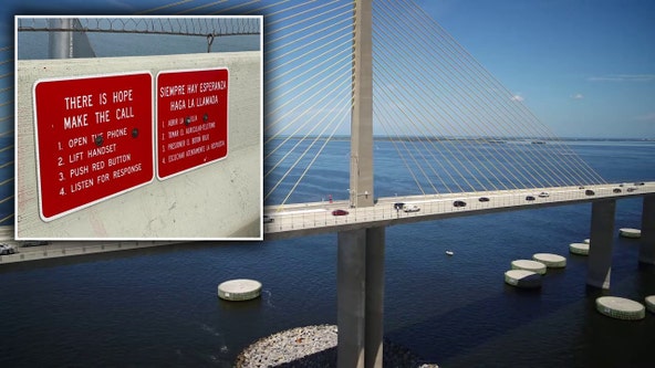 Crisis Center of Tampa Bay helps install signs on Sunshine Skyway: 'Reach out for help'