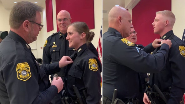 Two Tampa police officers pin badges to son, daughter in department's swear-in ceremony