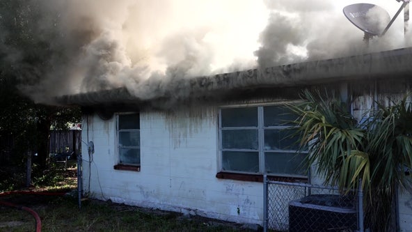 PHOTOS: Tampa house engulfed in flames, HCFR says fire considered suspicious