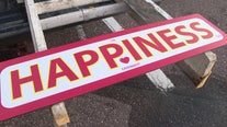 'If there was a time for happiness, it's now:' Happiness Experiment changes lives through signs