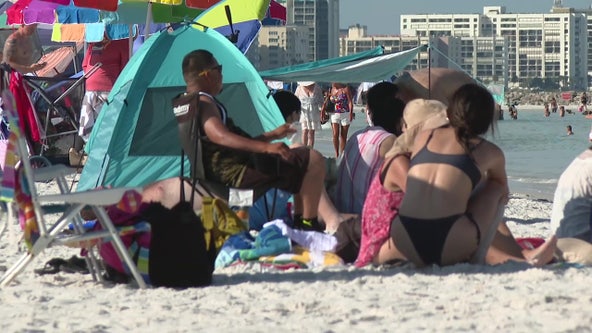 Extreme heat didn't stop beachgoers from enjoying Clearwater this holiday weekend