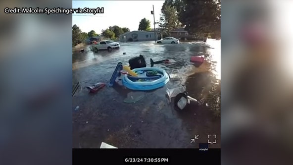 WATCH: Disastrous flooding in lakeside neighborhood forces family to abandon pool day