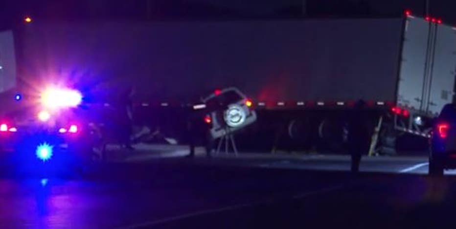 Driver, passenger trapped inside SUV after crashing into 18-wheeler in Baytown