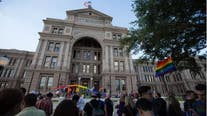 Judge temporarily blocks some Texas investigations into gender-affirming care for trans children