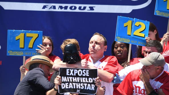Joey Chestnut puts protestor in chokehold during Nathan’s Hot Dog Eating Contest