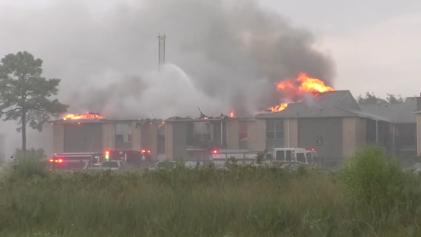 Houston firefighters battling 2-alarm fire in Webster
