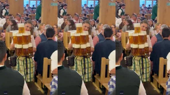 Watch this Oktoberfest server wow the room with her beer-carrying skills