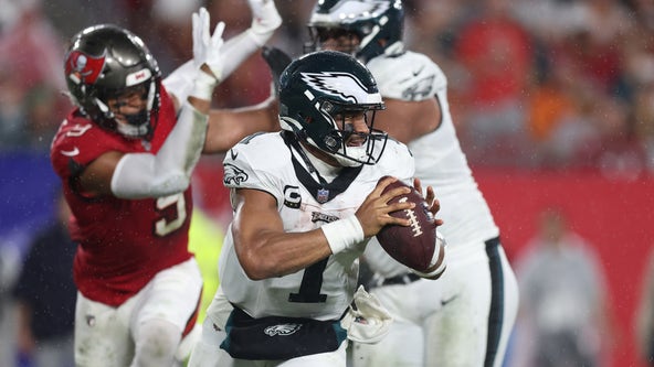 Jalen Hurts throws for TD, runs for another as Eagles thump Buccaneers 25-11 to remain unbeaten