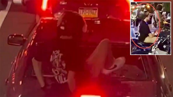 Biker accused of kicking in windshield, pulling gun on driver altercation in Center City charged