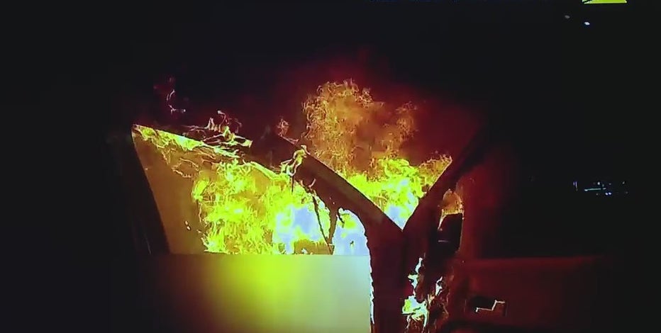 VIDEO: Southfield police officer pulls victim from burning SUV after high-speed crash