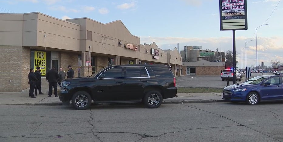 9-year-old boy, woman shot at Detroit strip mall