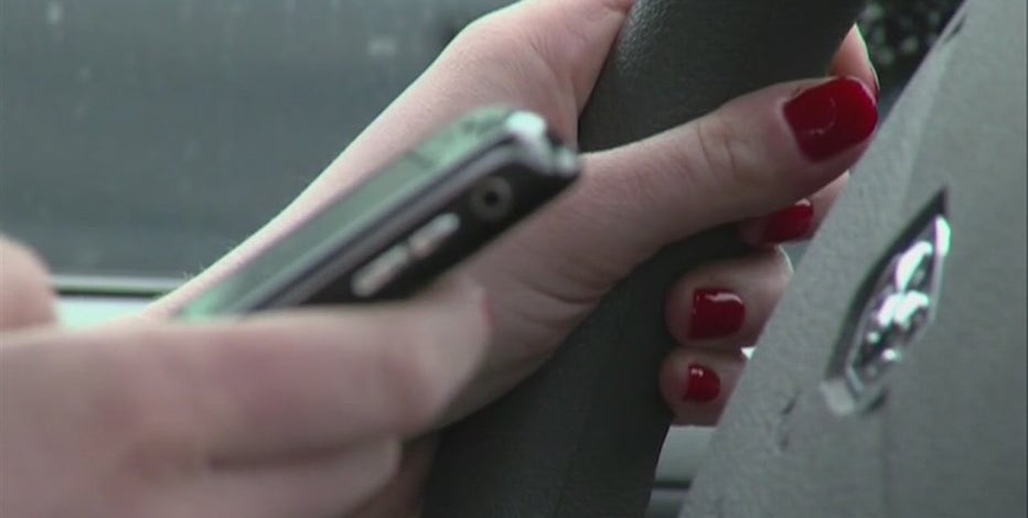 Michigan's new distracted driving rules outlaws more than just texting while behind the wheel