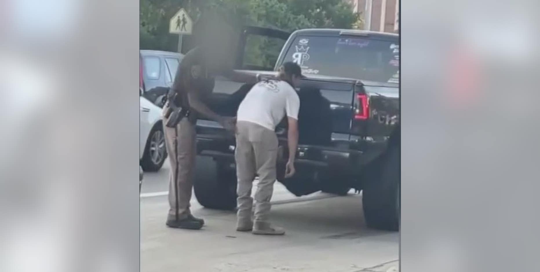 Deputy gives Dream Cruise driver a spanking after he did burnout on Woodward