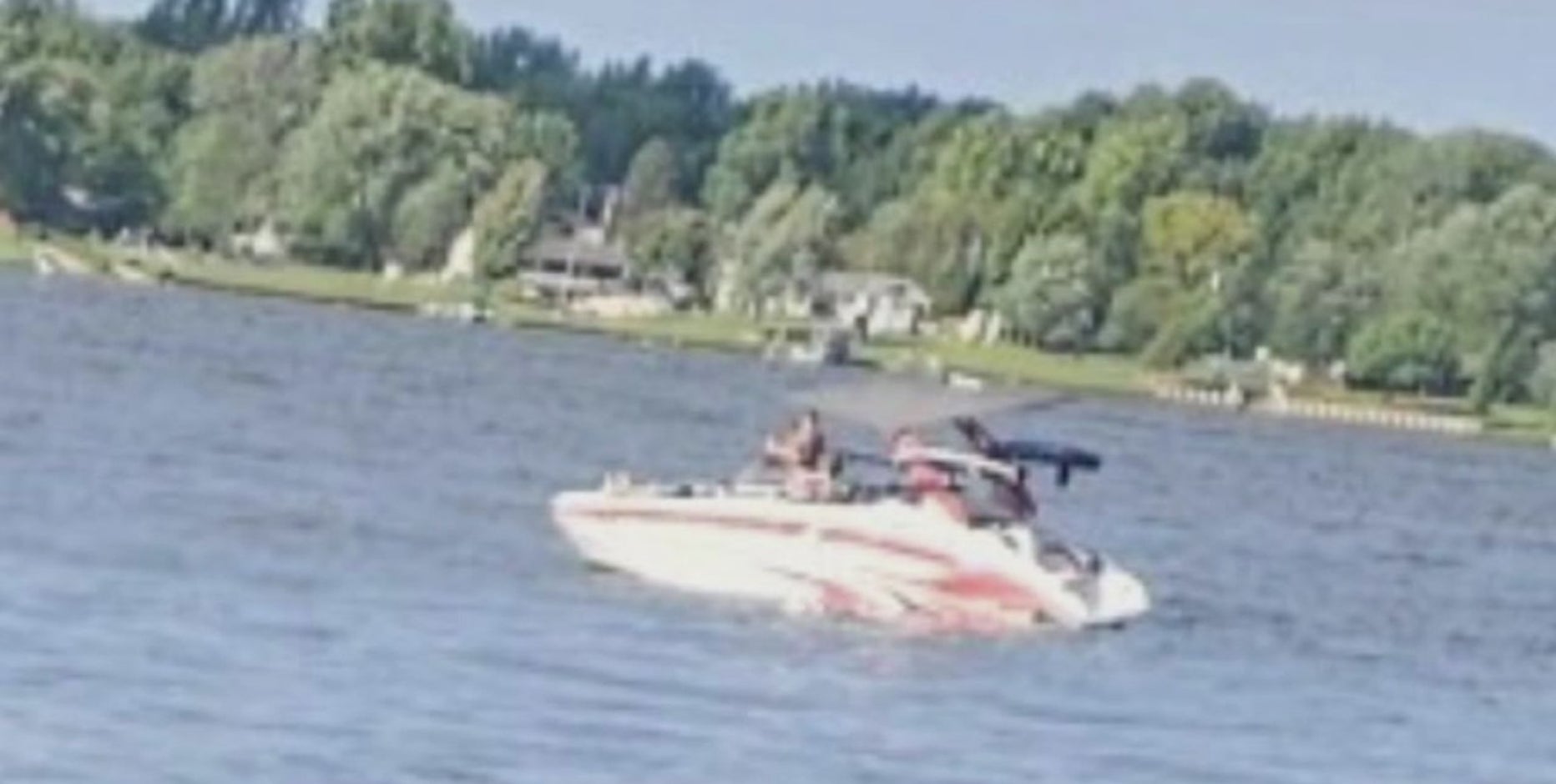 Boater flashes police badge after running over jet ski in Genesee County