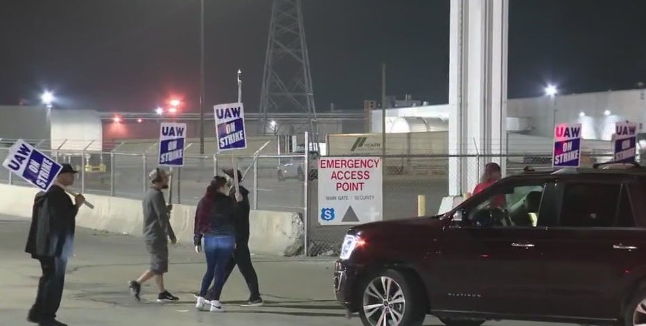 UAW strike day 7: GM, Stellantis announce layoffs as negotiations continue