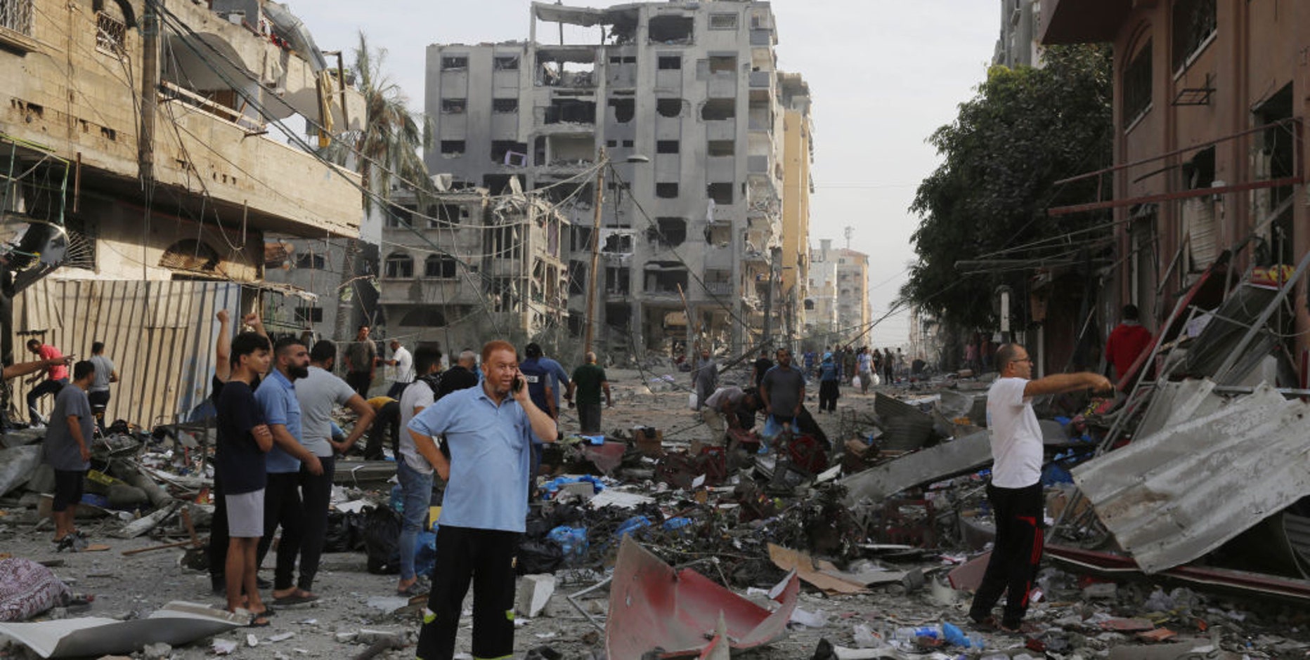 As airstrikes devastate Gaza, Israel forms unity government to oversee war sparked by Hamas attack