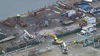Excavator knocks down power pole, stranding officials on Harrison Township island