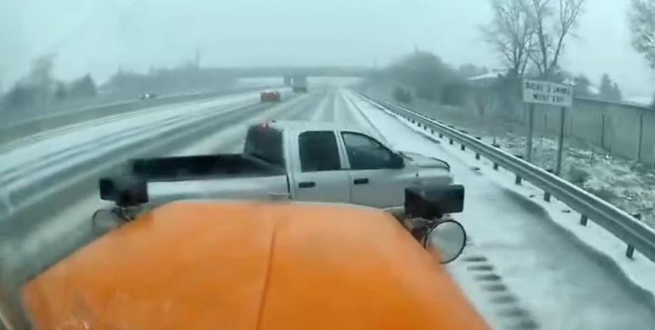 Video: Pickup truck loses control in snow, gets hit by plow on I-75