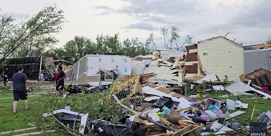 Tornado-warned storm destroys Michigan neighborhood