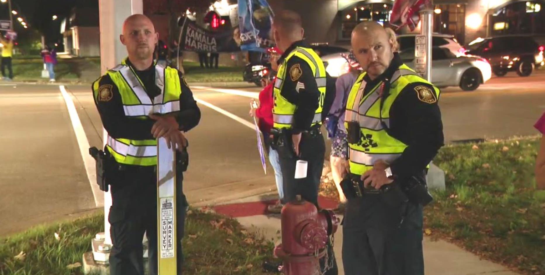 Livonia police provide security at dueling Harris-Trump protests across 7 Mile