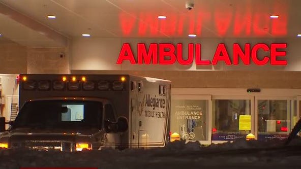 Truck crashes into Highland Park business, injuring worker inside
