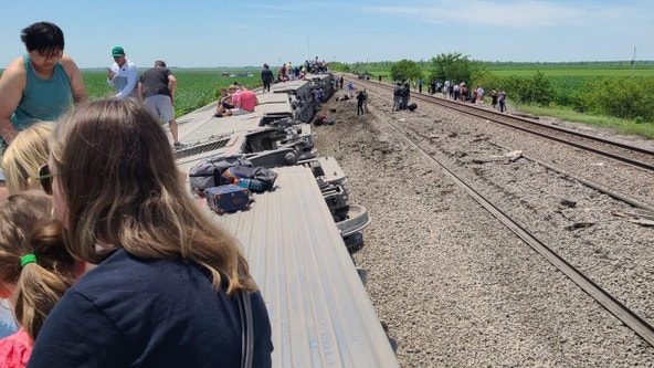 Injuries reported after Amtrak train traveling to Chicago strikes truck, derails