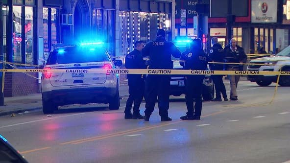 2 shot while inside Chicago business
