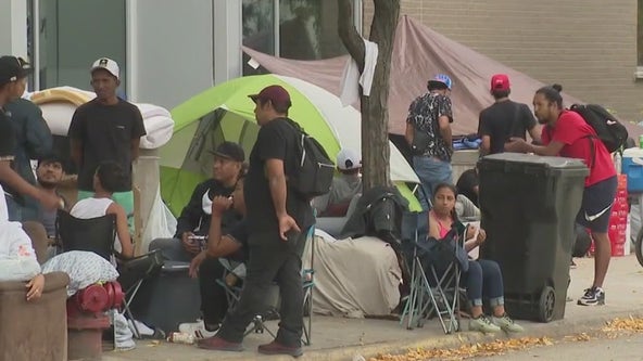 Thousands of migrants crowd police districts, O'Hare as they await placements