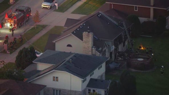Crews respond to large house fire in Richton Park