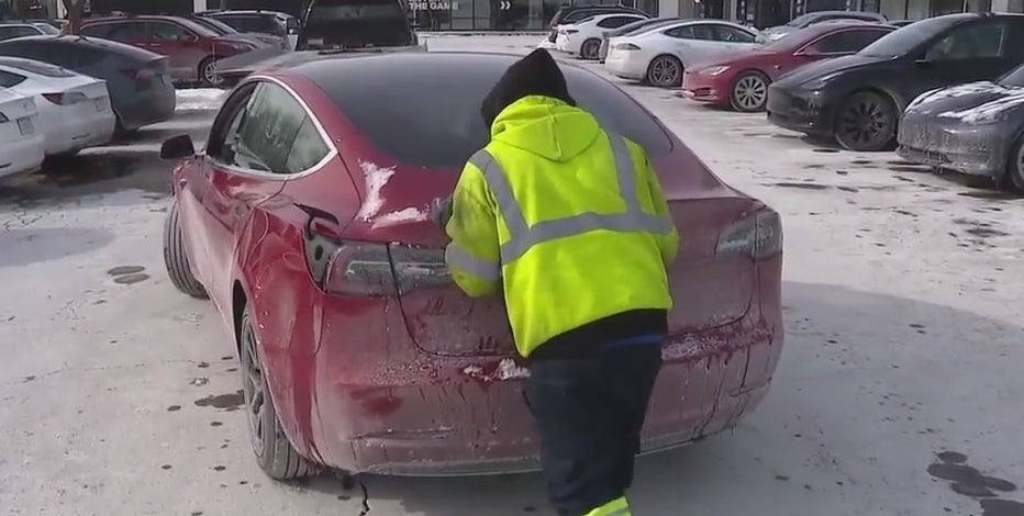 Tesla supercharging station packed in Oak Brook, dead cars line parking lot due to frigid temps