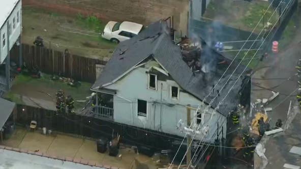 Fire rips through roof of home on West Side, prompting large emergency response