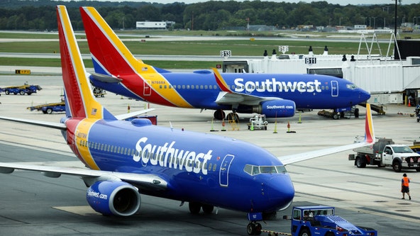 Travelers at Midway airport react to Southwest Airlines' new seating policy