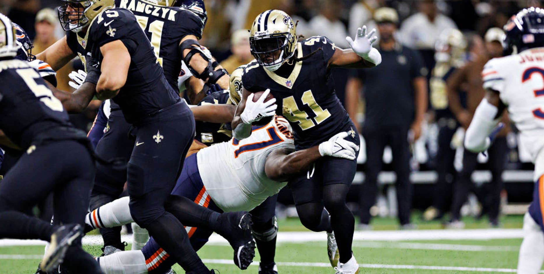 Behind the different strings that tie the Chicago Bears and New Orleans Saints together